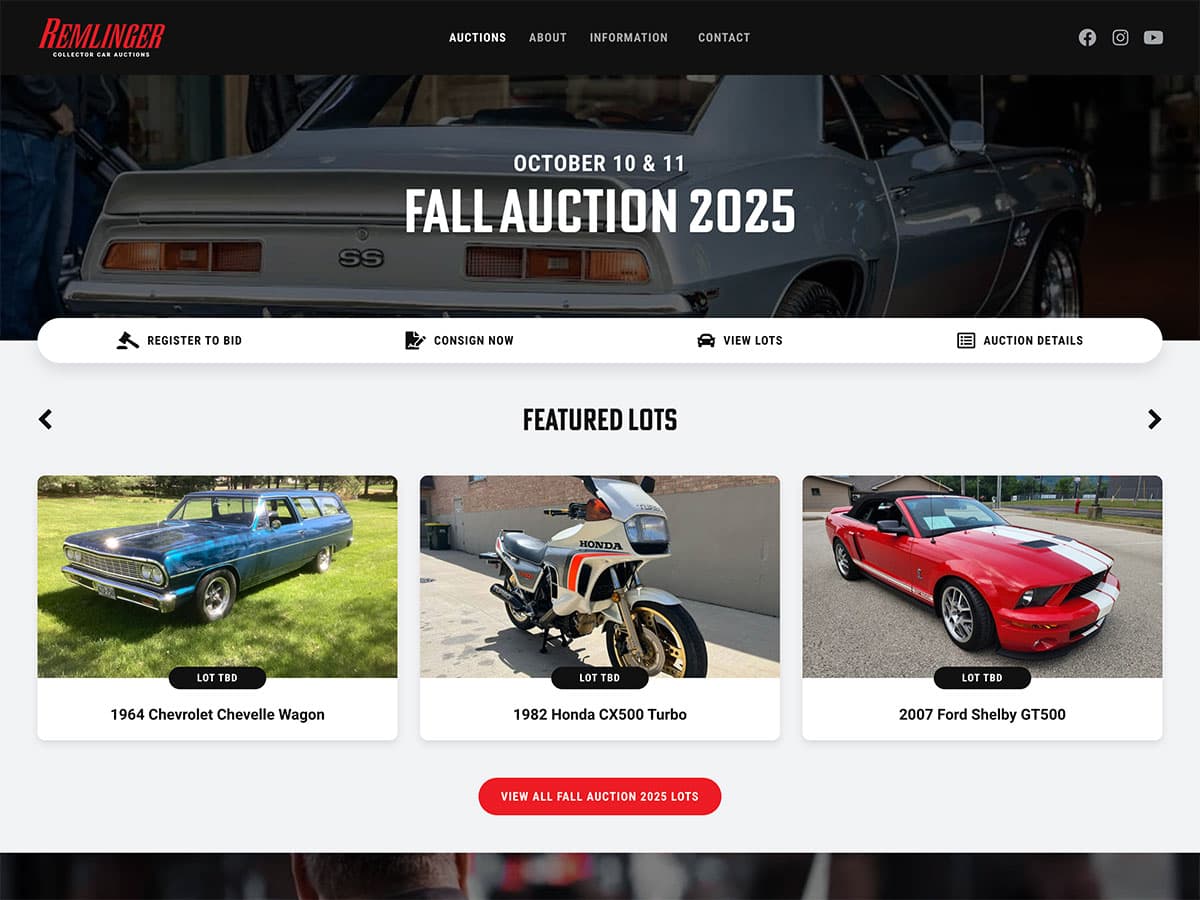 Classic car auction event with vintage and collectible vehicles, including Chevrolet, Honda, and Ford models.